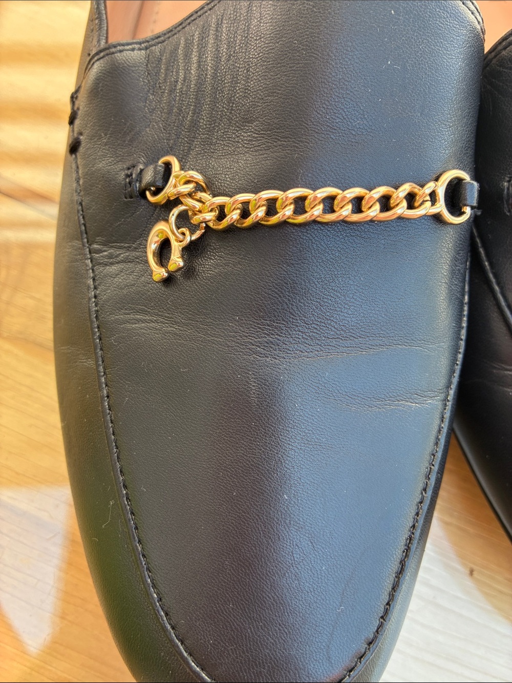 Coach Black Leather Loafers with Gold Chain Accent - Picture 2 of 8